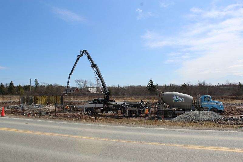 Pouring a foundation with a pump truck in Enfield, Nova Scotia